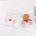 Self-sealing Christmas cookie bag with snowman and white dots on transparent OPP - 10*10+3 Snowman Couple