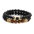 Set di bracciali con perle nere opache, pietre occhio di tigre e corone dorate - Set Oro