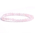 Close-up of 4mm natural rose quartz beaded bracelet with translucent pink stones - Rose Quartz