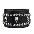 Wide black leather bracelet featuring metallic skulls and rivets on a clean white background - Skull / Black