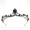 Detail of baroque crown featuring black beads and antique gold metal frame on white backdrop - No.3 Antique Gold (Black Stone)