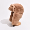 Thick brown faux fur trapper hat with ear flaps and buckle on wooden stand - One Size / Coffee