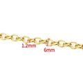 Macro view of 1.2mm gold stainless steel oval link chain showing precise 6mm dimensions - 18K Gold Plated Cable Chain 1.2x6mm