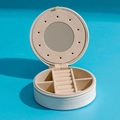 Detail view of mini white travel jewelry box with mirror and velvet ring organizer - Mirror Style / White