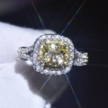 Macro shot of square yellow gemstone ring with diamond halo on gloved finger - Adjustable Open / No.4-Square Yellow Stone