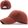 Detail of dark brick red washed cotton ponytail baseball cap with distressed torn edges - Adjustable / Orange