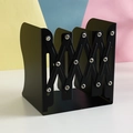 Adjustable matte black metal bookend with expandable X-shaped structural design - Minimalist Black