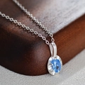 Sky blue zircon pendant necklace in S925 silver on dark wood background - 925 Silver / Silver