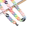 Macro shot of colorful acrylic eyeglass chain in candy colors on a notebook - 15 Multi-color