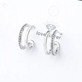 Boucles d'oreilles double créoles argentées avec anneau poli et pavé de zircons étincelants - Or Blanc