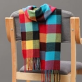 Detail of colorful plaid scarf texture with soft fringe edges on a wooden chair - Multi Color Plaid (34)