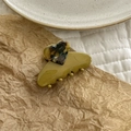 Detail view of heart-shaped acetate hair claw clip with green base and tortoiseshell heart - Mustard Yellow