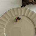Detail of tortoise shell acetate hair claw clip on a minimalist ceramic plate display - Mini Fragment Clip