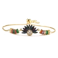Bracciale regolabile placcato oro 18 carati con ciondoli a farfalla e sole in zirconi colorati - Stile Sole/Occhio