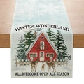 Winter wonderland linen table runner featuring reindeer and cabins on wooden table - Winter Wonderland Cabin Reindeer
