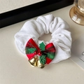 Close-up of white velvet scrunchie with Christmas bells, red-green bow and holly leaves - White Bells Bow