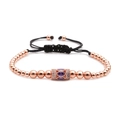 Roségoldenes verstellbares Perlenarmband mit lila Zirkonia und schwarzer Kordel - Roségold