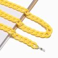 Detail of a bright yellow acrylic eyewear chain with silicone loops on white background - Lemon Yellow (29)