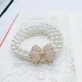 Elegant multi-layer pearl waist chain with gold rhinestone butterfly clasp for women - Spreading Butterfly Gold