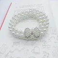 Elegant multi-layer cream pearl waist chain with rhinestone bow buckle decoration - Sparkling Bowtie Silver