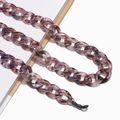 Macro detail of dark purple marble pattern acrylic chain with black non-slip rubber loops - Pink Purple Marble