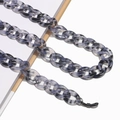 Detail of grey marble pattern acrylic eyewear chain with black anti-slip rubber loops - Grey Marble Pattern