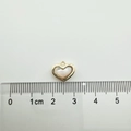 18K gold-plated heart pendant with white shell inlay shown on a ruler for scale - Medium Minimalist Style / Medium Heart (White Shell)