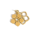 Dettaglio di un ciondolo a forma di fiore dorato con petali traforati per gioielli - Oro