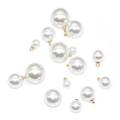 Detailed macro view of white ABS imitation pearl pendants with gold metal rings for DIY jewelry - 6mm / KC Gold