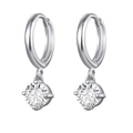 Detail of silver hoop earrings featuring four-prong set round-cut zircon pendants - 24K / Round Silver Color (W80009-SS)