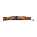 Detailed macro view of acetate hair clip with classic brown tortoiseshell pattern and gold clip - Coffee
