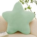 Star-shaped plush pillow in light green soft fabric on a beige sofa - Light Green