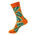 Orange mid-calf crew socks featuring green monstera leaf patterns in soft knit cotton - 1050 Orange Leaf