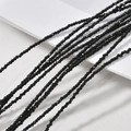 Dettaglio di mini perle tonde in madreperla nera da 2-2,5mm per la creazione di gioielli - 1 filo (circa 185 perline) / Perline rotonde in conchiglia a farfalla nera 2-2,5 mm