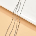 Macro view of silver stainless steel O-chains for DIY jewelry making and necklaces - 2# 2mm Lip Chain (1m)