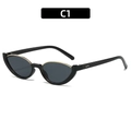 Occhiali da sole cat-eye neri con dettagli in metallo dorato e lenti grigie - Montatura Nera Lenti Grigio Nero (C1)