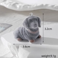Macro detail of grey flocked dachshund charm with metal loop and 3.2cm height scale - Sitting Dachshund