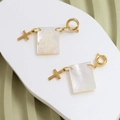 Detail view of gold-plated mother of pearl rectangular pendant with religious relief icon - Square