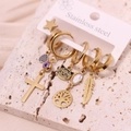 Golden stainless steel earring set featuring evil eye, tree of life, and heart charms - Style 2
