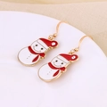 Close-up of Christmas snowman earrings with red scarf details and gold hooks - Snowman with Rhinestone