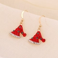 Detailed close-up of festive Christmas hat earrings with sparkling red and white rhinestones - Red Christmas Hat with Rhinestone