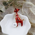 Elegant giraffe brooch with red enamel and pearl accent on a vintage background - DY12-Red Gold Giraffe