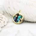 Macro view of a 18k gold-plated round pendant with abalone shell inlay and zircon stars - Large Planet 16.8*21.8mm
