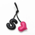 Handmade leather S-letter and pink heart bag charm with black cord on white background - Black with Rose Red Heart