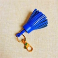 Chic vibrant blue leather tassel keychain with gold-tone metal clasp accessory - Sapphire Blue