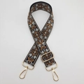 Close-up of adjustable jacquard bag strap with vintage floral pattern and gold hooks - Black Brown Gold Hook