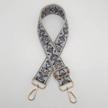 Detail of blue and brown ethnic jacquard bag strap with gold metal hooks and buckle - Beige Light Blue Gold Hook