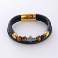 Pulsera de hombre en cuero trenzado con piedras ojo de tigre y un colgante de cruz - Cuentas de Color Marrón