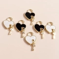 Minimalist heart padlock and key pendants with pearl white and black enamel finish - Multicolor