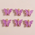 Set of six purple sequin acrylic butterfly pendants with gold metal edges for DIY jewelry - Purple